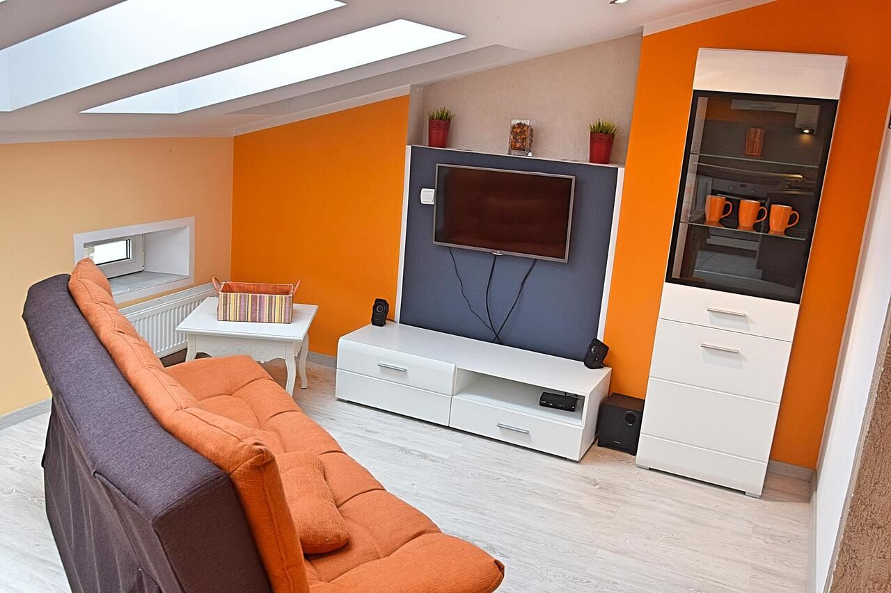 Апартаменты Apartament Orange Loft Свиноуйсьце-5